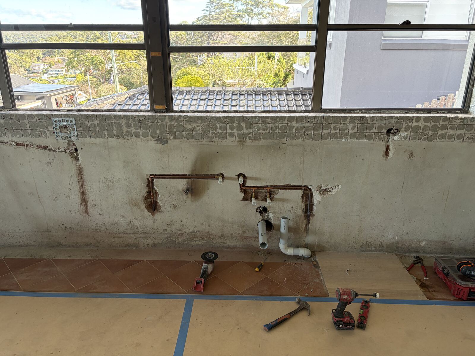 Copper pipework rough-in with harbour view